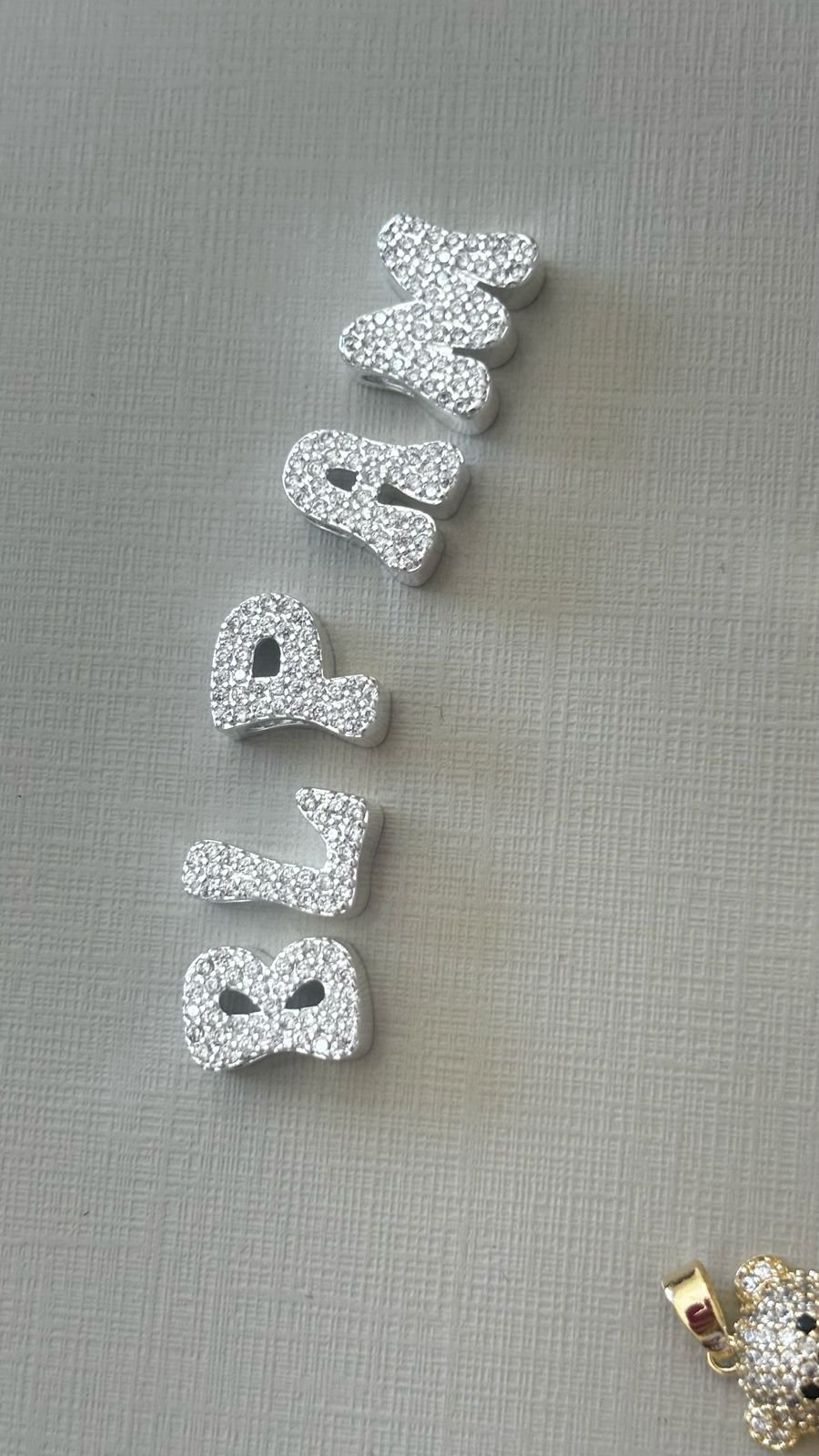 M.P letrinhas zirc. crav. 1 cm