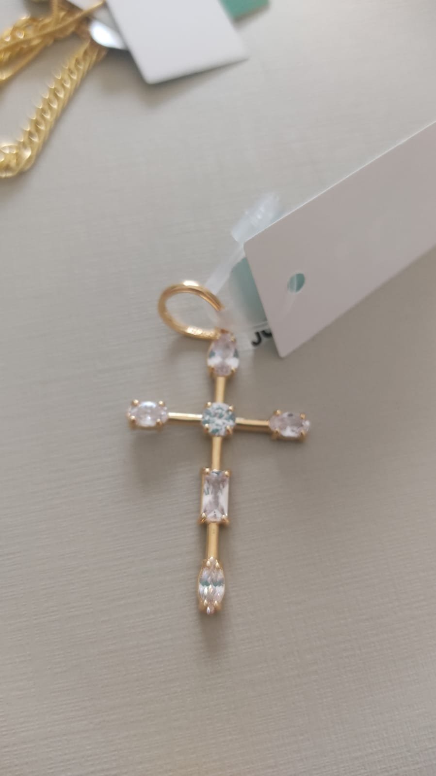 M.O BRUNA cruz pedras cristal e zirc. crav.