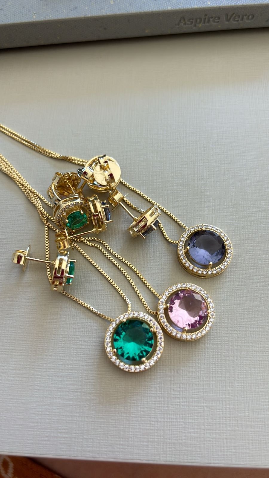 Conj.O redondo zirc. crav. (pedra rosa , roxo e aqua)