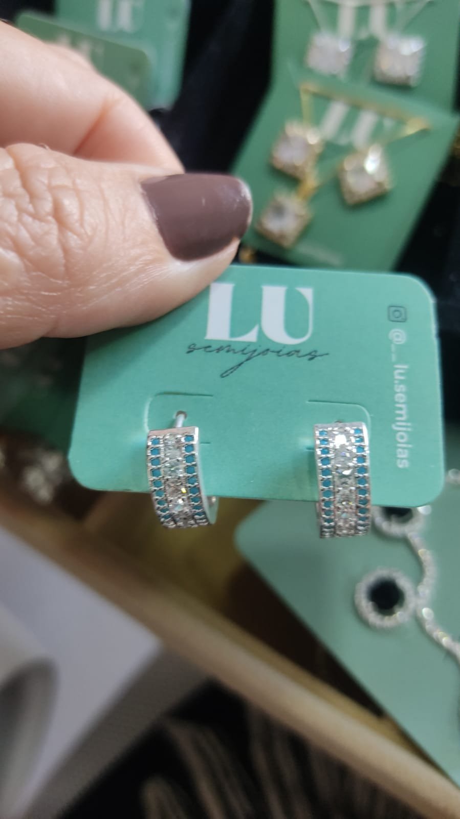 B.P argola luxo zirc.agua marinha e cristal crav.