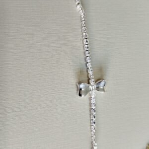 P. P. riviera cristal laço