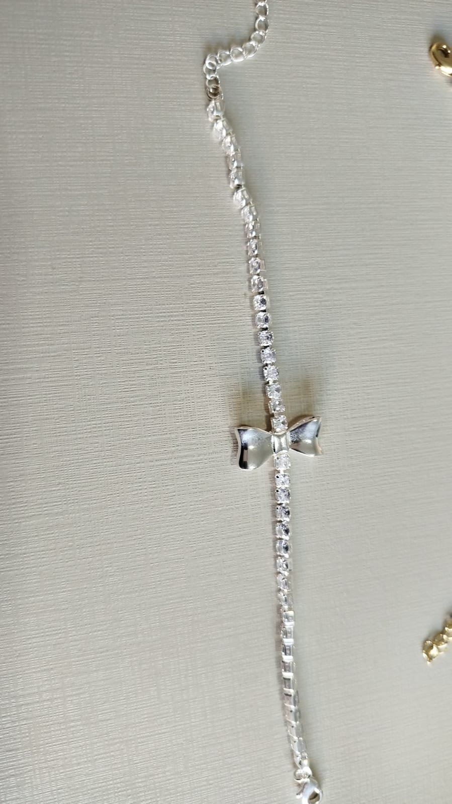 P. P. riviera cristal laço