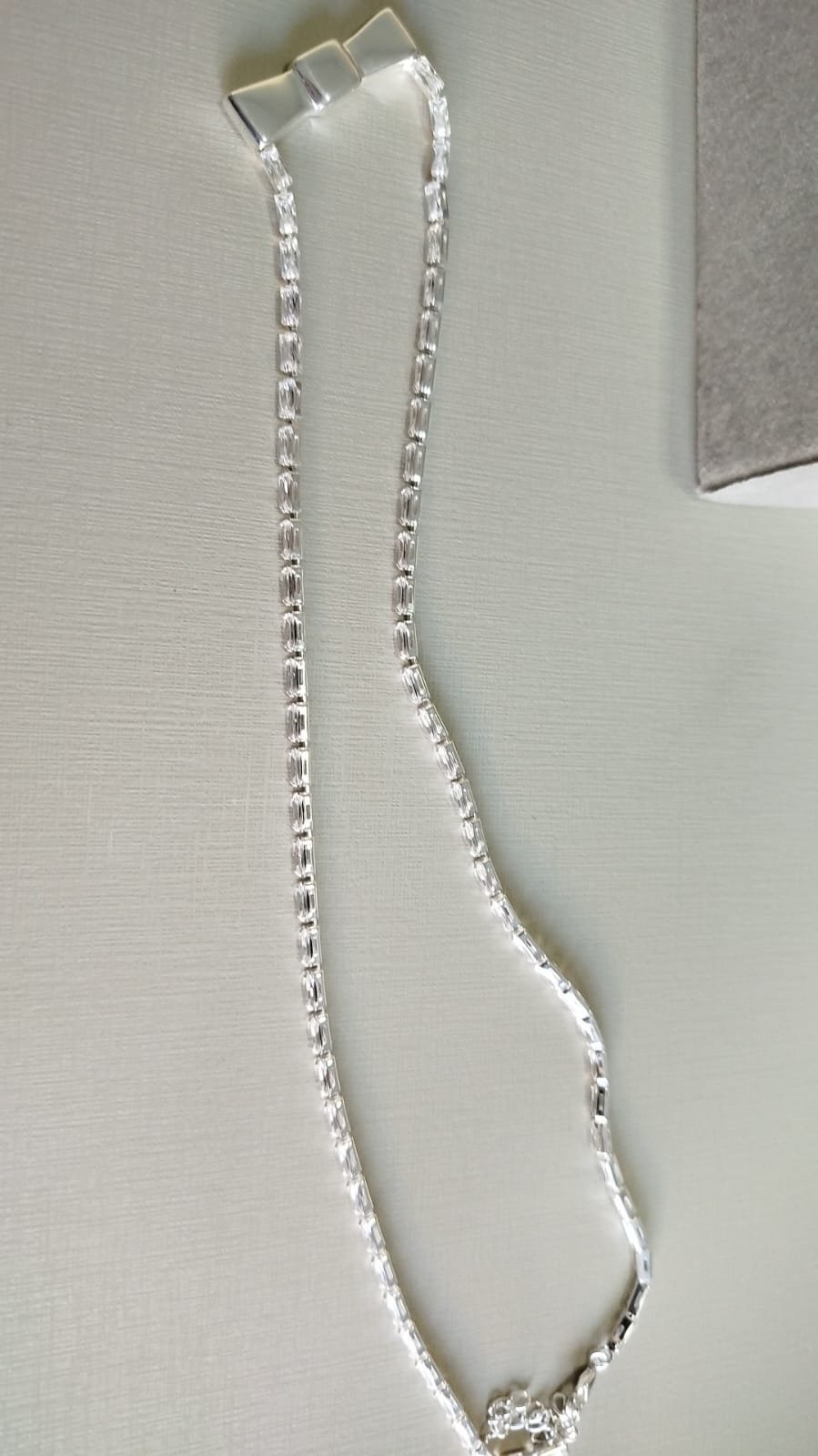 Gar. P. riviera baguete cristal laço