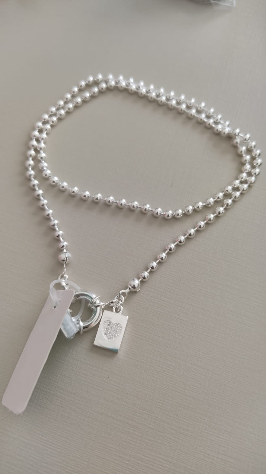 Gar. P bolinha fecho noia com ping. plaquinha coração zirc.