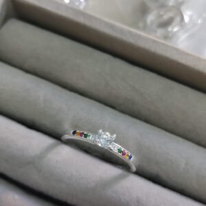 A.P solitário cristal com zirc. color.