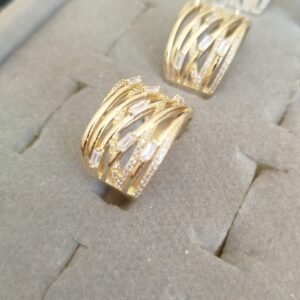 A.O nove traços com zirc. crav. e cristal