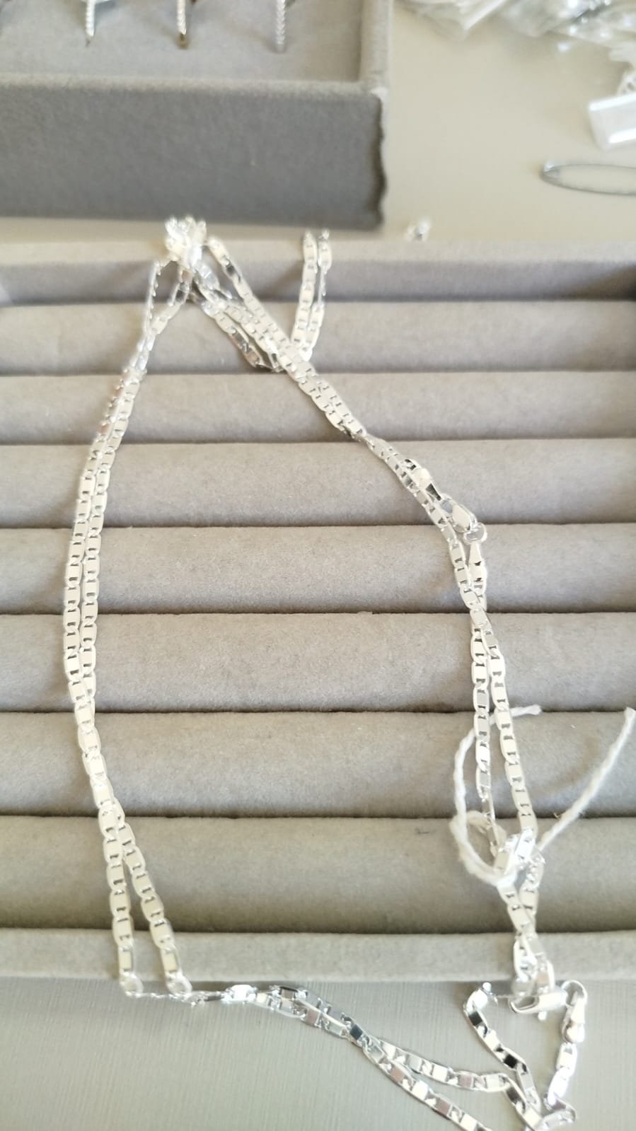 C.P masc. piastrini fina