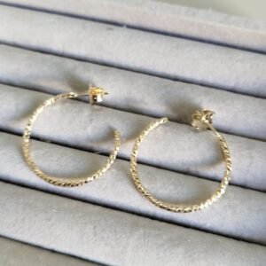 B.O argola fina textura