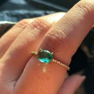 A.O solitario turmalina oval zirc. crav.