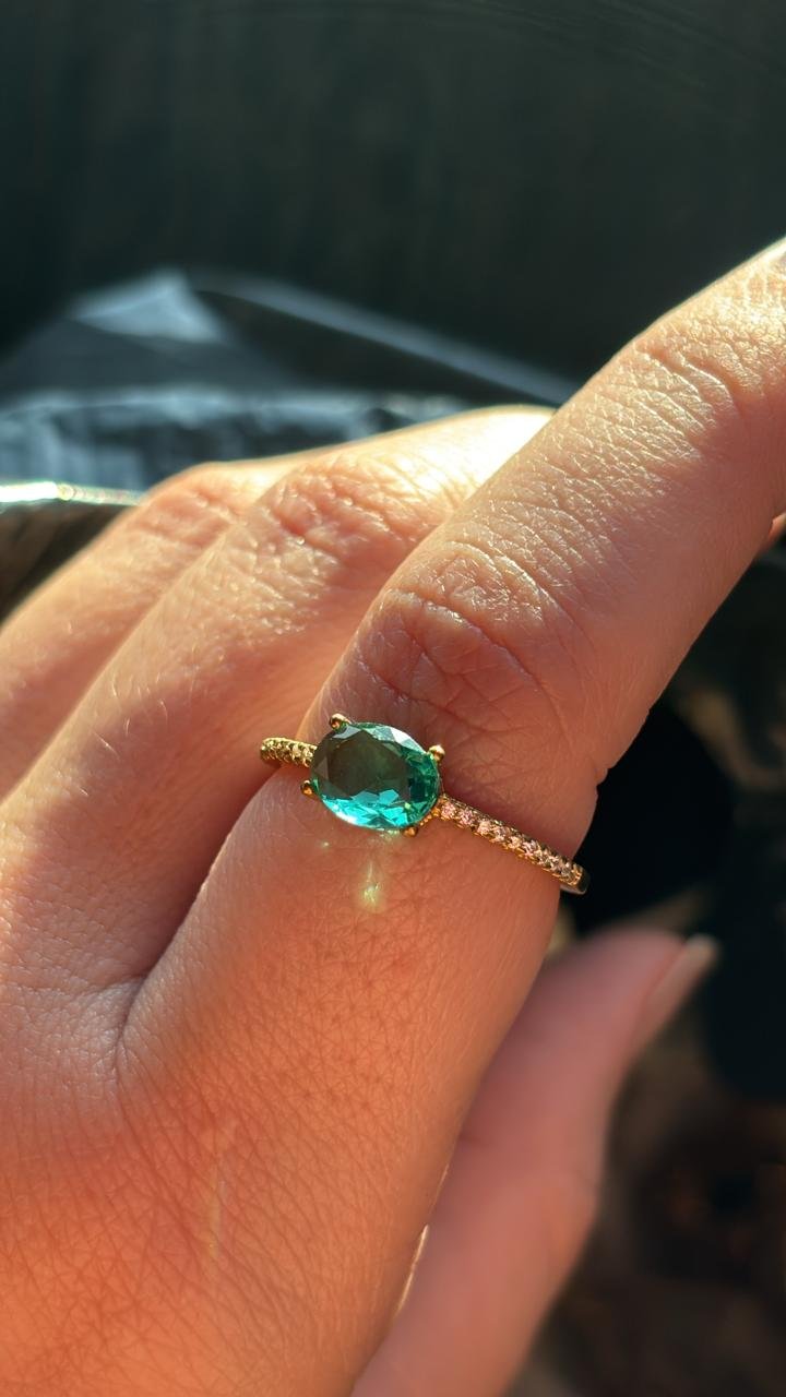 A.O solitario turmalina oval zirc. crav.