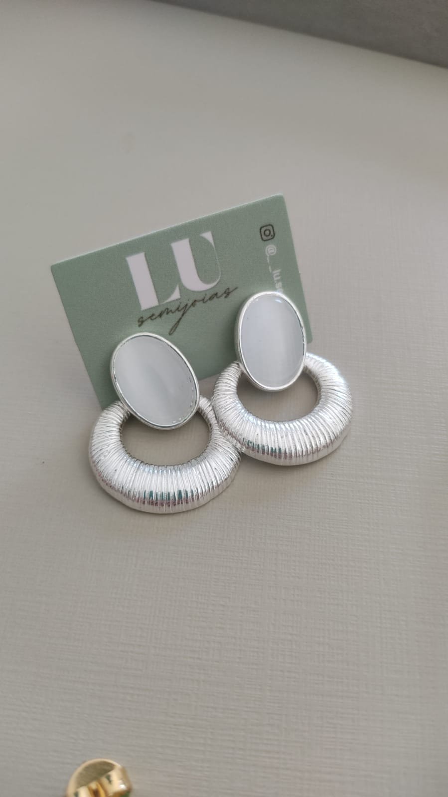 B.P pedra oval olho de gato